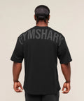 Camiseta oversized Gymshark negra con rojo